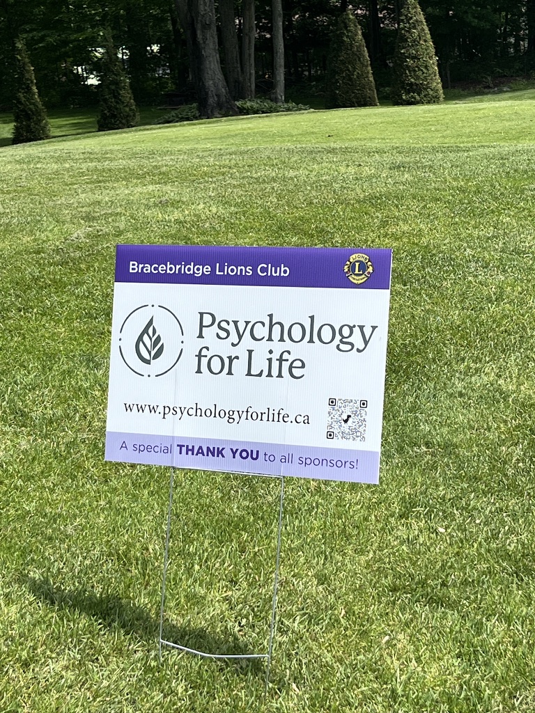 Psychology for Life sponsorship sign at Bracebridge Lions Club charity golf tournament.